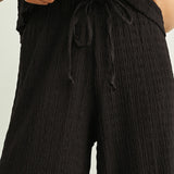 CRINKLED ELASTIC PANTS