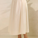 SMOCKED WAIST POPLIN MAXI SKIRT