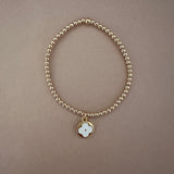 3mm gold filled bracelet with raised flower charm
