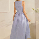 SLVLESS STRIPED SMOCKED MAXI DRESS