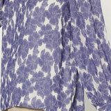 SPLIT NECK TOP WITH RUFFLE SHOULDER