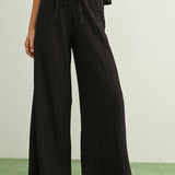CRINKLED ELASTIC PANTS