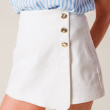 GOLD BUTTON MINI SKORT
