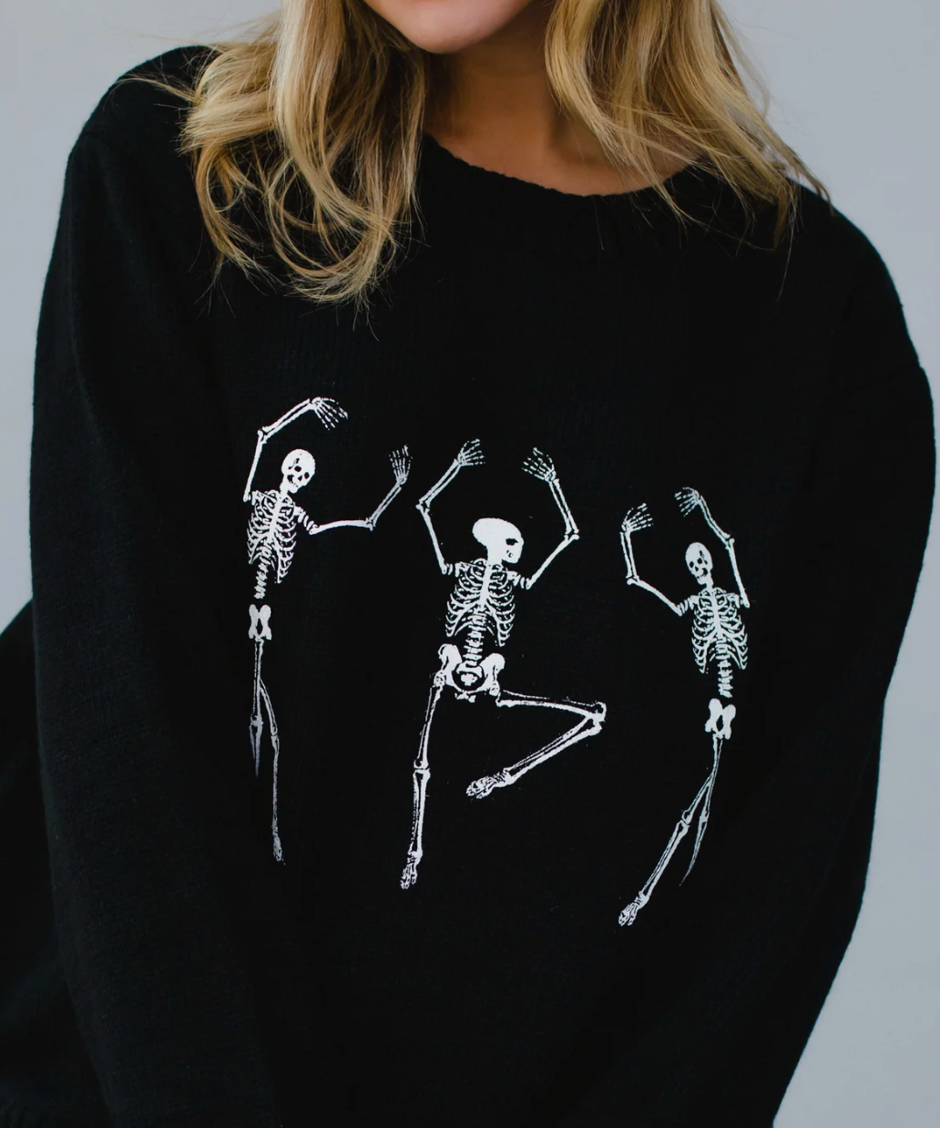 DANCING SKELETONS SWEATER