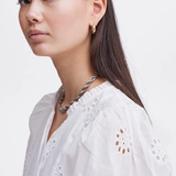 WHITE BLOUSE W/ EMBROIDERED FLOWER DETAIL